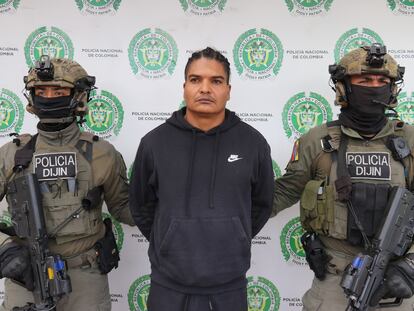 Larry Changa en custodia de la Policía de Investigación Criminal de Colombia, el 1 de julio.