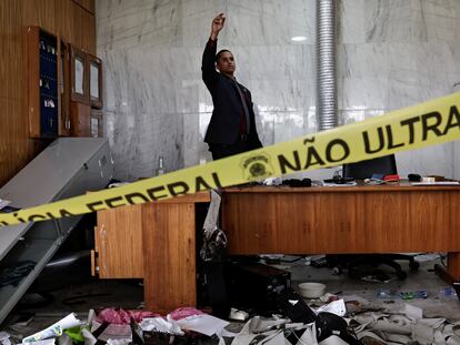 A person inspects the damage, after the supporters of Brazil's former President Jair Bolsonaro anti-democratic riot at Planalto Palace, in Brasilia, Brazil, January 9, 2023. REUTERS/Ueslei Marcelino