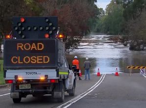 Australia orders evacuation as dam spills, rain pummels in Sydney