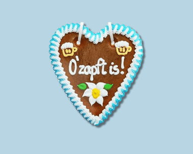 Entdecke Oktoberfest-Angebote. Sortiment von Oktoberfestprodukten (Lebkuchenherz mit Aufschrift "O'zapft is")