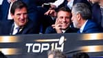 Florian Grill avec Emmanuel Macron et René Bouscatel lors de la finale de Top 14 en juin 2023