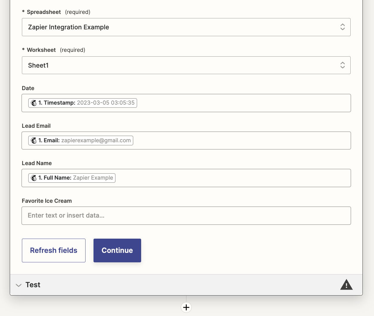 Fields in a Google Sheets action step in the Zap editor with data from the previous Mailchimp trigger added to some fields.