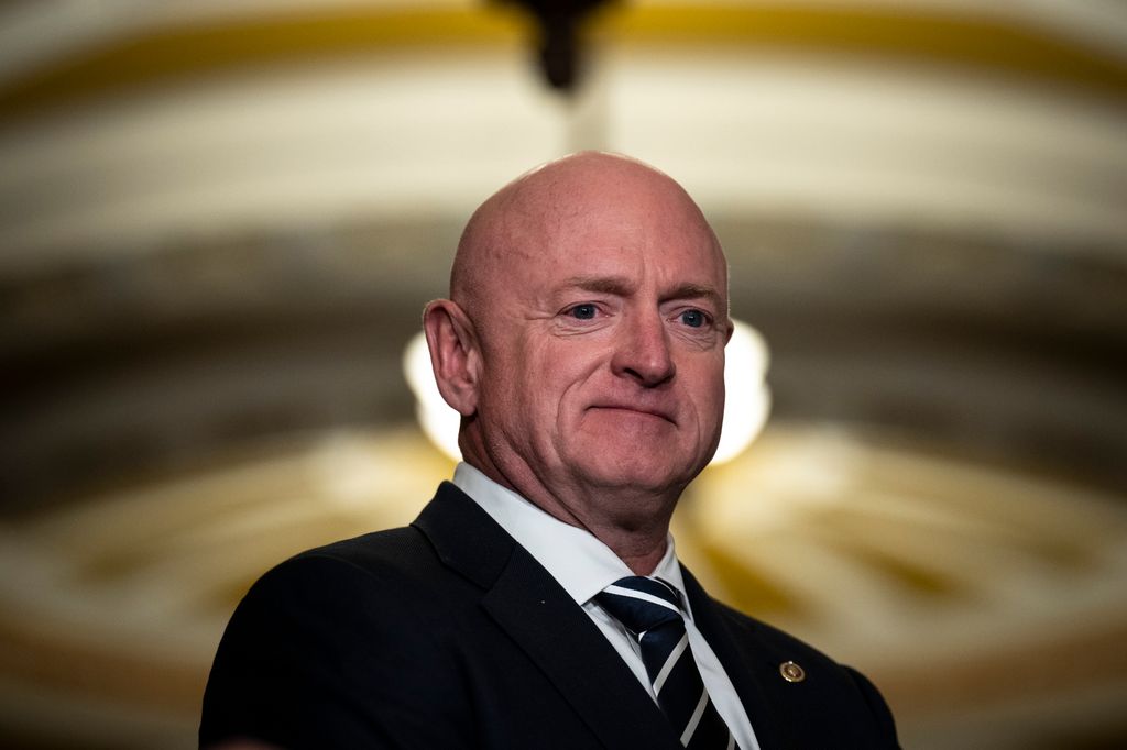 Sen. Mark Kelly (D-AZ) waits to speak during a news conference following a closed-door lunch meeting with Senate Democrats at the U.S. Capitol March 22, 2023 in Washington, DC