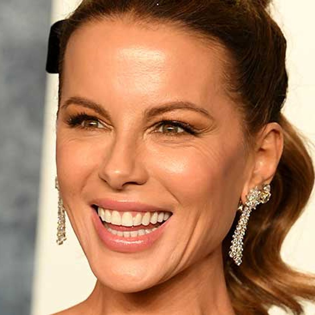 Kate Beckinsale showcases washboard abs in micro bikini in new photos