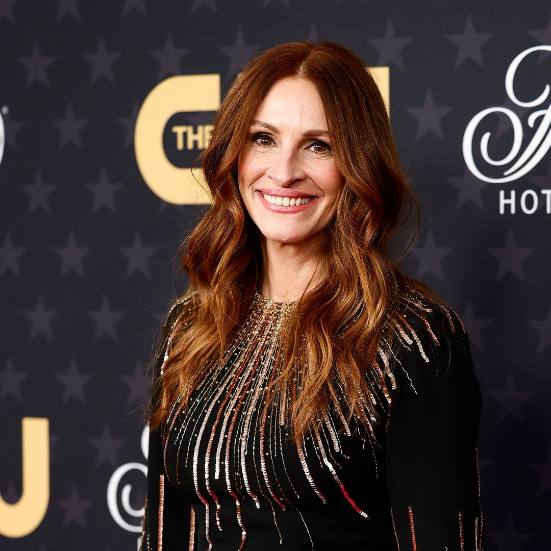 Julia Roberts cozies up to husband Danny Moder in a mini dress in new snap from Wimbledon