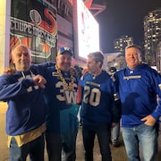 Carl Bangert et les gens avec qui il est allé voir la 111e Coupe Grey au stade BC Place, à la sortie du match le 17 novembre 2024