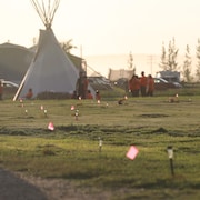 Veillée aux chandelles organisée par la Première Nation Cowessess sur le site de l'ancien pensionnat pour Autochtones de Marieval, en Saskatchewan, le 26 juin 2021.