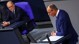 Olaf Scholz und Friedrich Merz im Bundestag