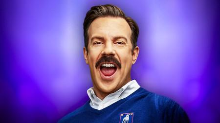 Jason Sudekis smiling as Ted Lasso