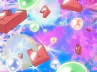 Esferas/Gemas y partes rojas en la imaginación del Equipo/Team Rocket.