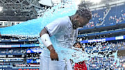 Toronto Blue Jays first baseman Vladimir Guerrero Jr. (right) is doused with ice water by third baseman Luis De Los Santos (not pictured) after defeating the St. Louis Cardinals at Rogers Centre on Sept 14.