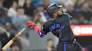 Toronto Blue Jays third baseman Vladimir Guerrero Jr. (27) hits a double against the St. Louis Cardinals during the fourth inning at Rogers Centre on Sept 13.