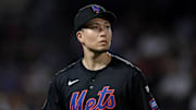 Jul 26, 2024; New York City, New York, USA; New York Mets starting pitcher Kodai Senga (34) looks back at the main scoreboard during the fourth inning against the Atlanta Braves at Citi Field. Mandatory Credit: Vincent Carchietta-Imagn Images