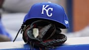 Jul 30, 2021; Toronto, Ontario, CAN; A Kansas City Royals hat and glove in the dugout during a game against the Toronto Blue Jays at Rogers Centre. Mandatory Credit: John E. Sokolowski-Imagn Images