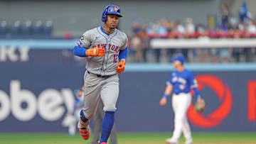 Sep 11, 2024; Toronto, Ontario, CAN; New York Mets shortstop Francisco Lindor (12) runs the bases after hitting a home run against the Toronto Blue Jays during the ninth inning at Rogers Centre. Mandatory Credit: Nick Turchiaro-Imagn Images