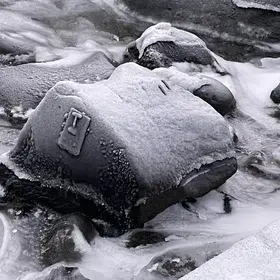 A geologist's footprint in a river deep in Iceland