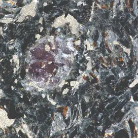 Garnet with sulphide inclusions in a Precambrian biotite gneiss from the Alutaguse zone, East Estonia.