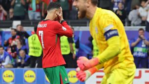 Jan Oblak celebrant la seva aturada davant de Cristiano Ronaldo