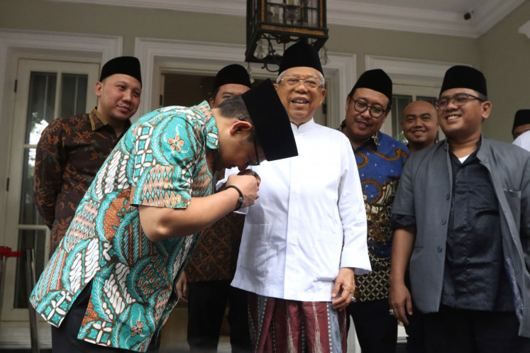 Chairman of the Nation Awakening Party (PKB) Muhaimin Iskandar pays his respects to vice president-elect Ma’ruf Amin as they meet in Menteng, Central Jakarta, on Friday, July 05, 2019. Muhaimin is eyeing the chairmanship of the People’s Consultative Assembly (MPR). 