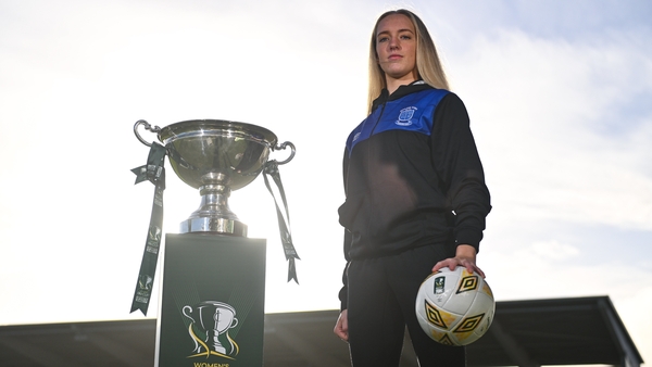 Athlone Town's Katie Keane poses alongside the Women's FAI Cup trophy