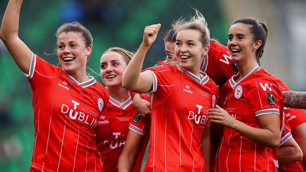 Kate Mooney (C) is mobbed after finding the net against Athlone Town