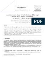 Asymmetric Non-Linear Forced Vibrations of Free-Edge Circular Plates. Part II: Experiments