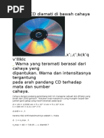 Sebuah CD Diamati Di Bawah Cahaya