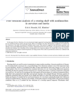 Free Vibrations Analysis of A Rotating Shaft With Nonlinearities in Curvature and Inertia