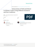 Performance Enhancement of Shell and Helical Coil Water Coolers Using Different Geometric and Fins Conditions