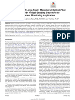 Development of Large-Strain Macrobend Optical-Fiber Sensor With Helical-Bending Structure For Pavement Monitoring Application