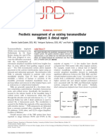 Prosthetic Management of An Existing Transmandibular Implant: A Clinical Report