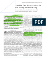 Multi-Level Reversible Data Anonymization Via Compressive Sensing and Data Hiding