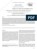 Evaluation of The Relationship Between Wisdom Teeth and Mandibular Fractures