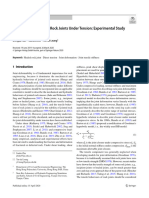 Deformation of Healed Rock Joints Under Tension Experimental Study and Empirical Model