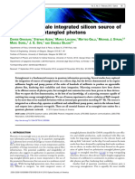 Micrometer-Scale Integrated Silicon Source of Time-Energy Entangled Photons