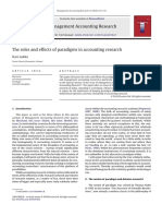 The Roles and Effects of Paradigms in Accounting Research