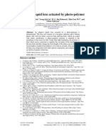 Adaptive Liquid Lens Actuated by Photo-Polymer