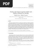 Testing and Design of Gravity-Loaded Steel Purlins Restrained by Sheeting