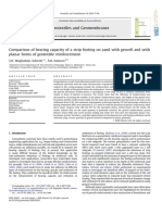 Comparison of Bearing Capacity of A Strip Footing On Sand With Geocell and With Planar Forms of Geotextile Reinforcement