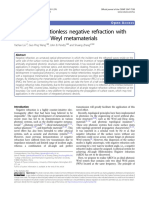 All-Angle Re Ectionless Negative Refraction With Ideal Photonic Weyl Metamaterials