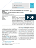 Stability Behavior of Steel-Concrete Composite Beams Subjected Hogging Moment