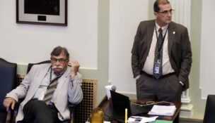 Rep. Rick West, R-Heavener, left, and Tom Gann, R-Inola, watch legislative proceedings on May 30, 2024, at the state Capitol. West and Gann are two of the lawmakers who filed the appeal of a Corporation Commission order. (Photo by Janelle Stecklein/Oklahoma Voice)