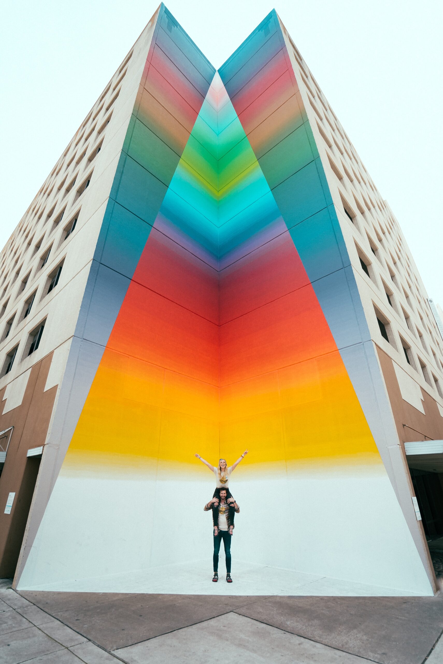 Man gives woman a piggyback ride in downtown Austin