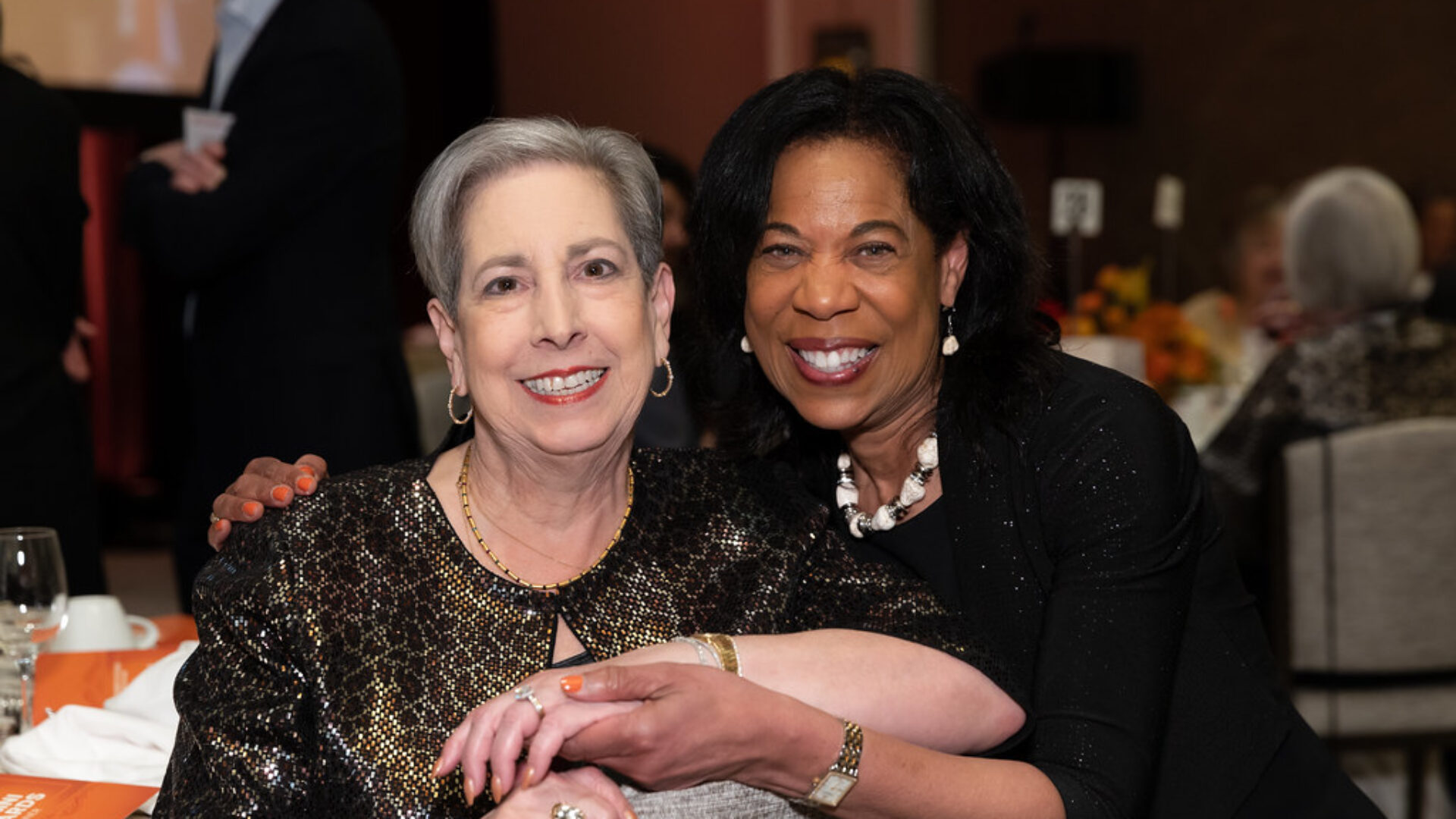 A photo of two alumni at the 2023 Alumni Awards including Lifetime Achievement award winner, The Hon. Marilyn Aboussie ’74