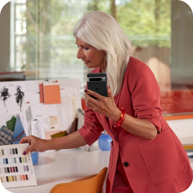 Woman working in her studio on her Pixel phone.