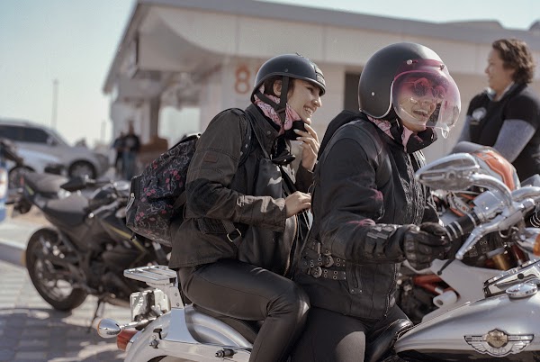 Women together on the roadside.