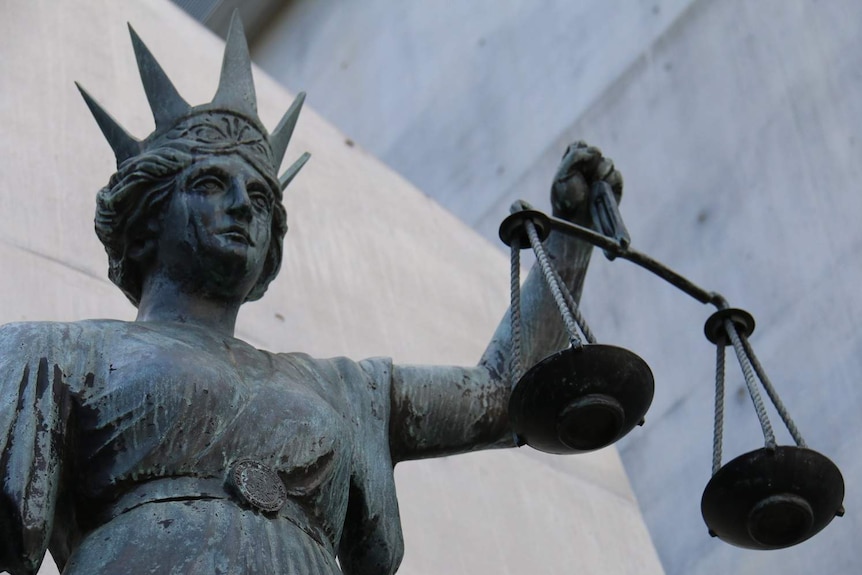 Close-up shot of Scales of Justice statue in Brisbane CBD on August 1, 2018.