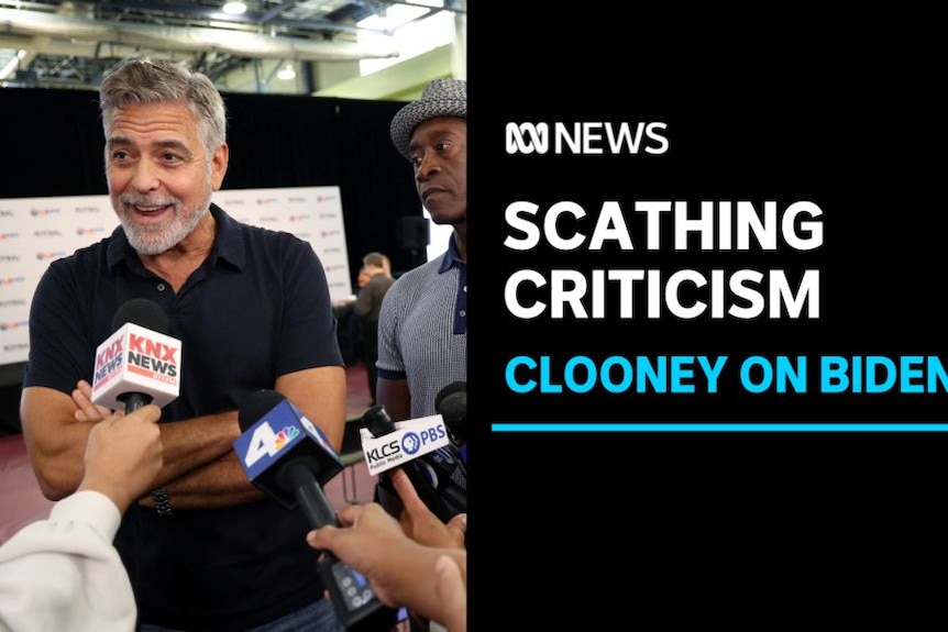 Scathing Criticism, Clooney on Biden: Clooney spiking while speaking into microphones at an event.