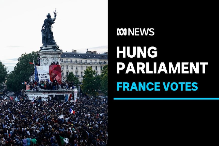 Hung Parliament, France Votes: A large crowd gathered around a statue in a city square. A French flag is on statue's base