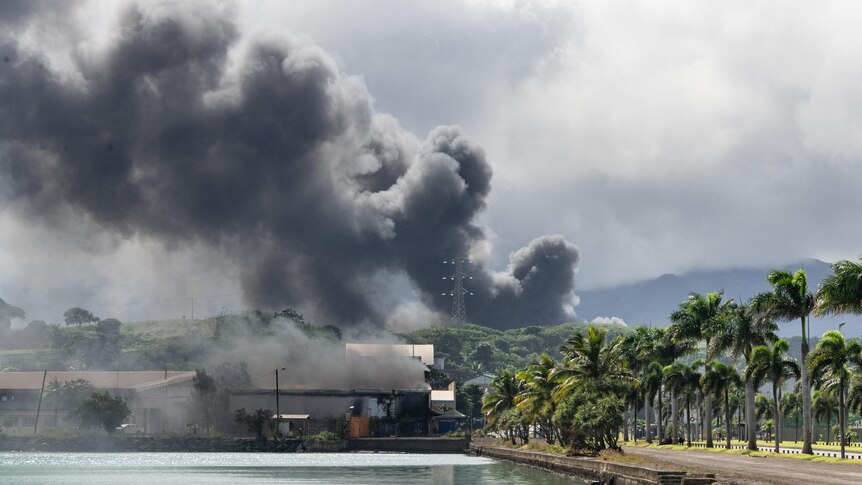 smoke over buildings.